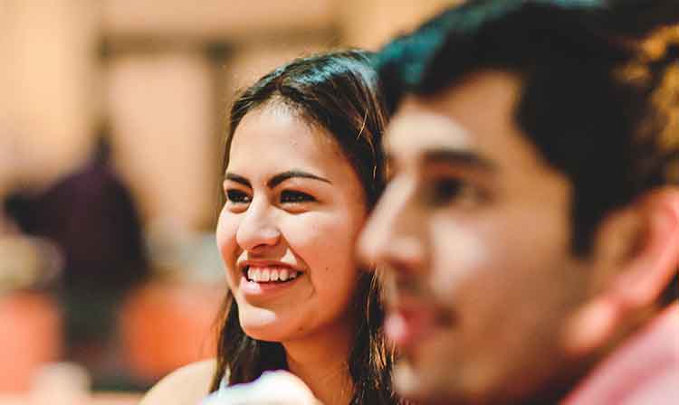 a student smiling