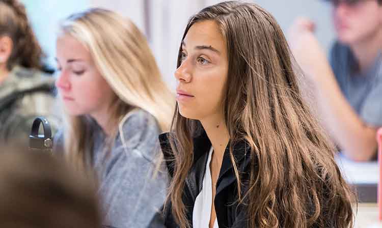 girl listening in class