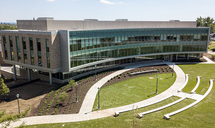 Exterior drone shot of Dolan school of business.