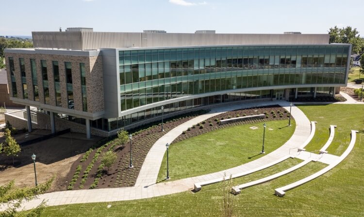 Exterior drone shot of dolan school of business.