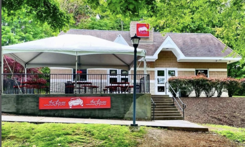 The exterior of a brick building with a red sign that reads “The Levee”. 