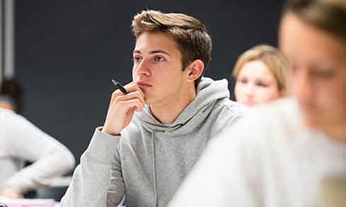 Student looking focused in class. 