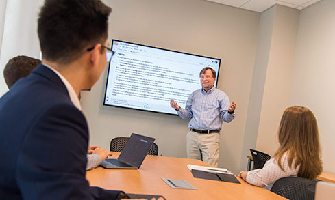 Professor and students in class.