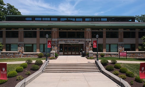 A frontal view of the university library building. 