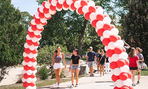 Image of students walking outside