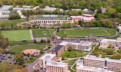 An aerial shot of Fairfield’s campus with buildings and athletic fields.