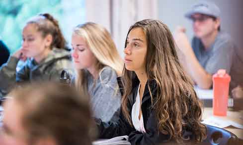 A student listens in class