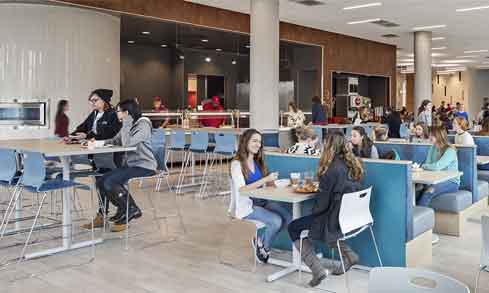 Students eating in the school’s dining hall. 