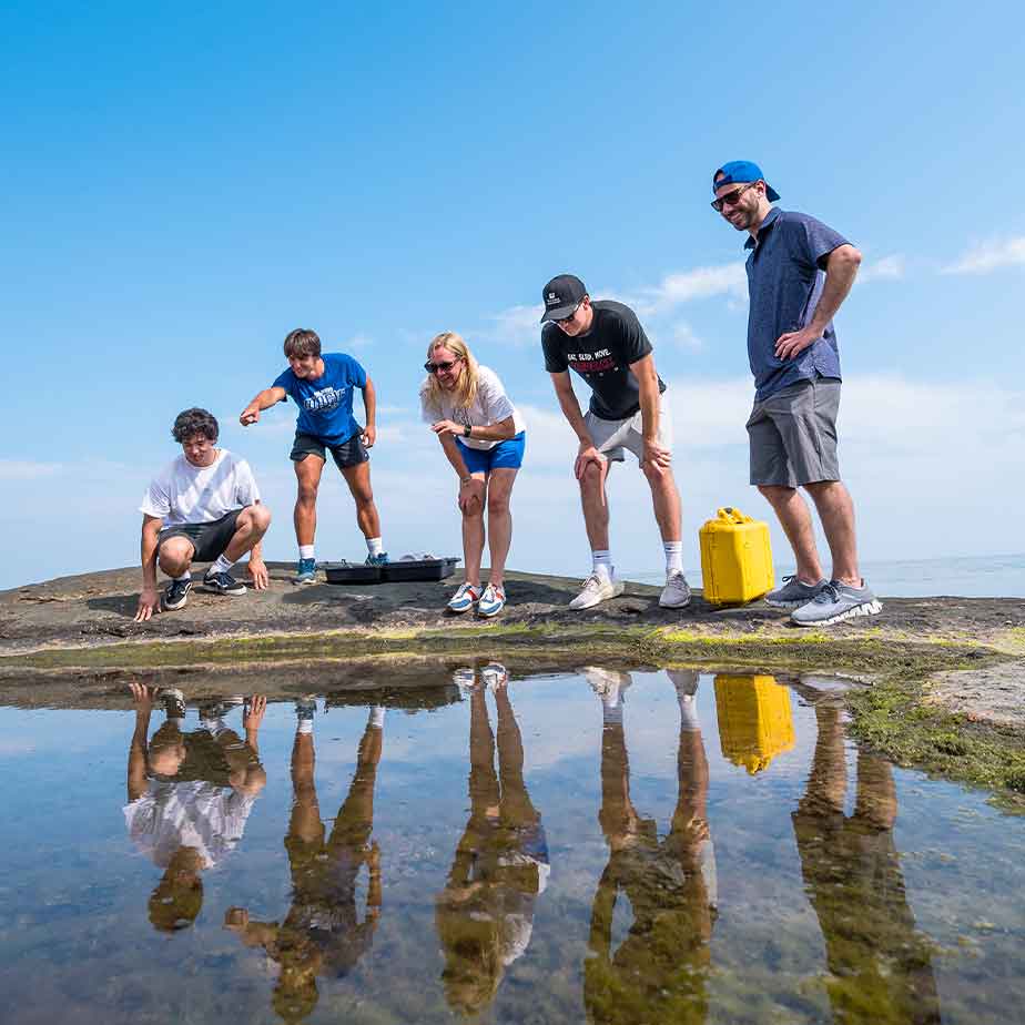 Students taking water samples