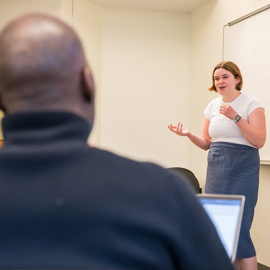 A student presenting to her class.