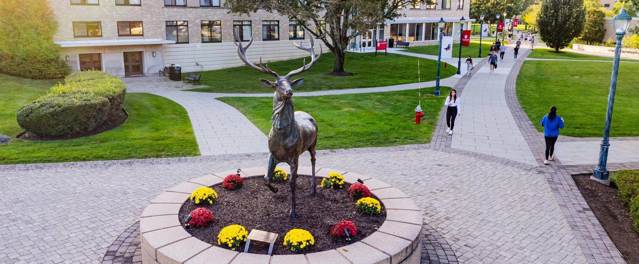 Stag statue in the center of campus.