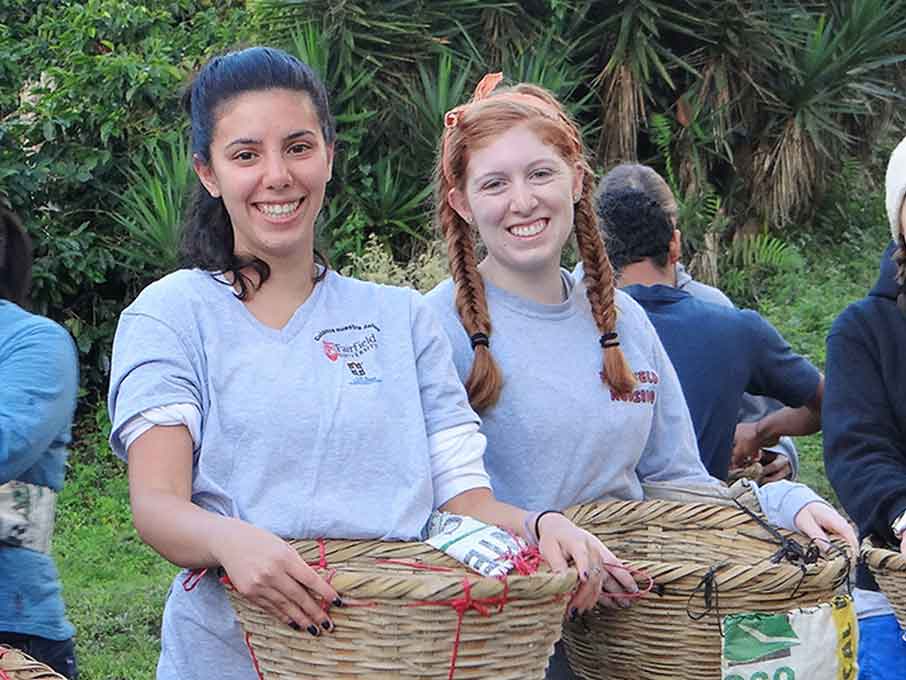 Two students volunteering.