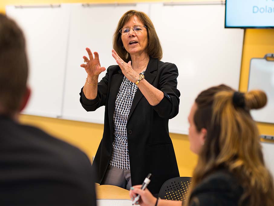 Image of students and professor in classroom