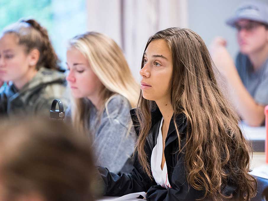 Student listening in a classroom.