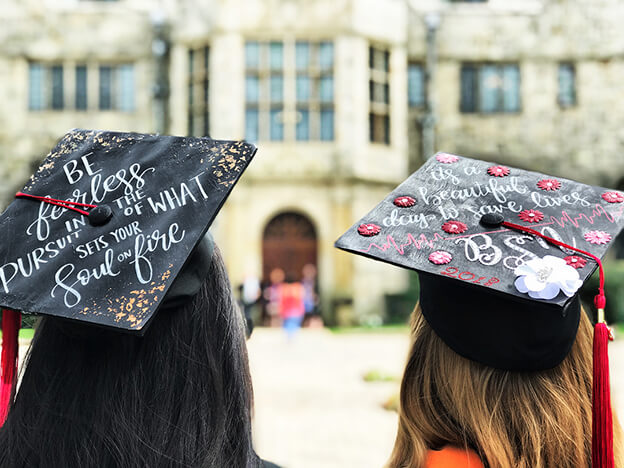 Two decorated graduation caps.