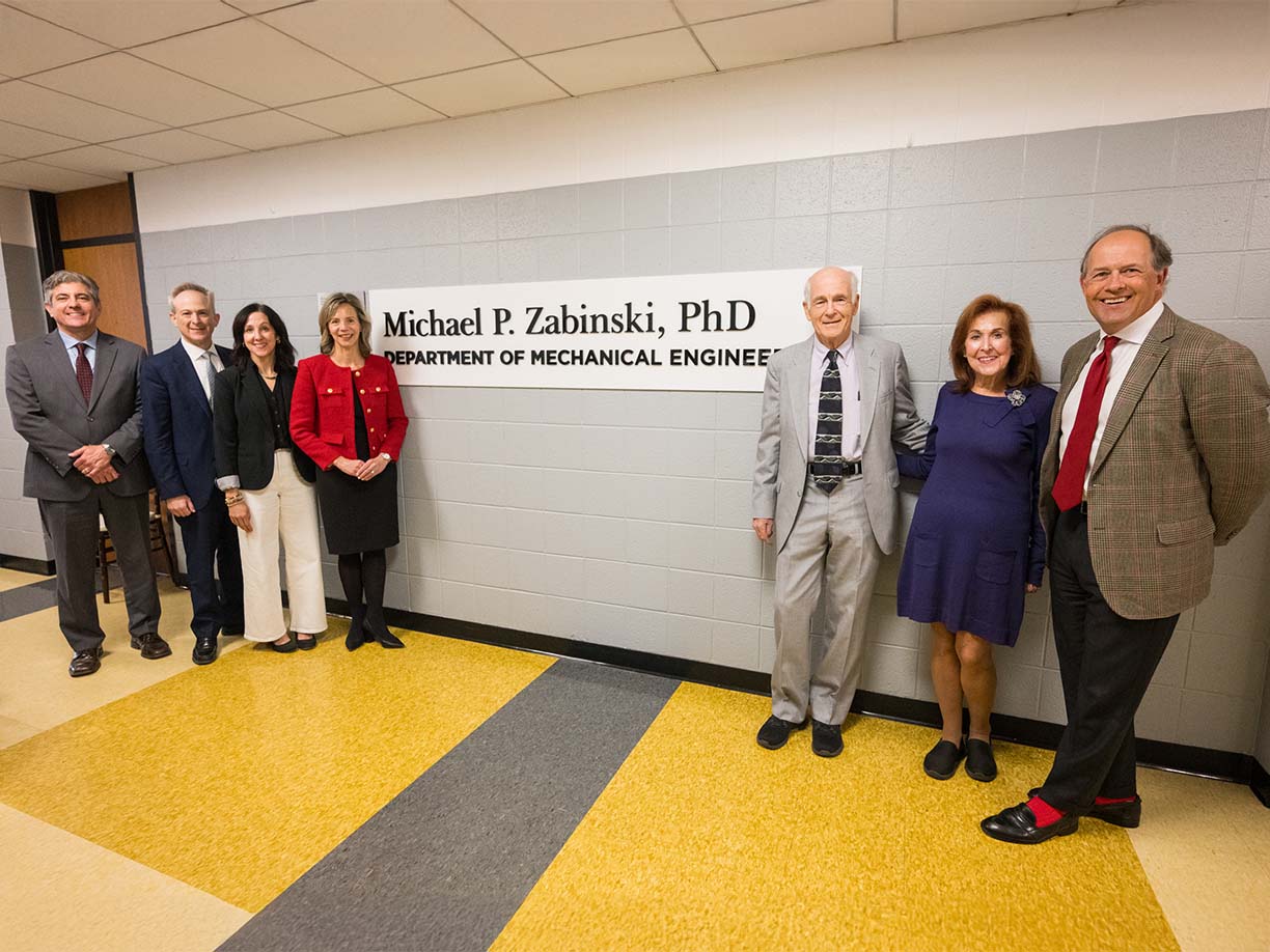 University's faculty and staff posing for pictures