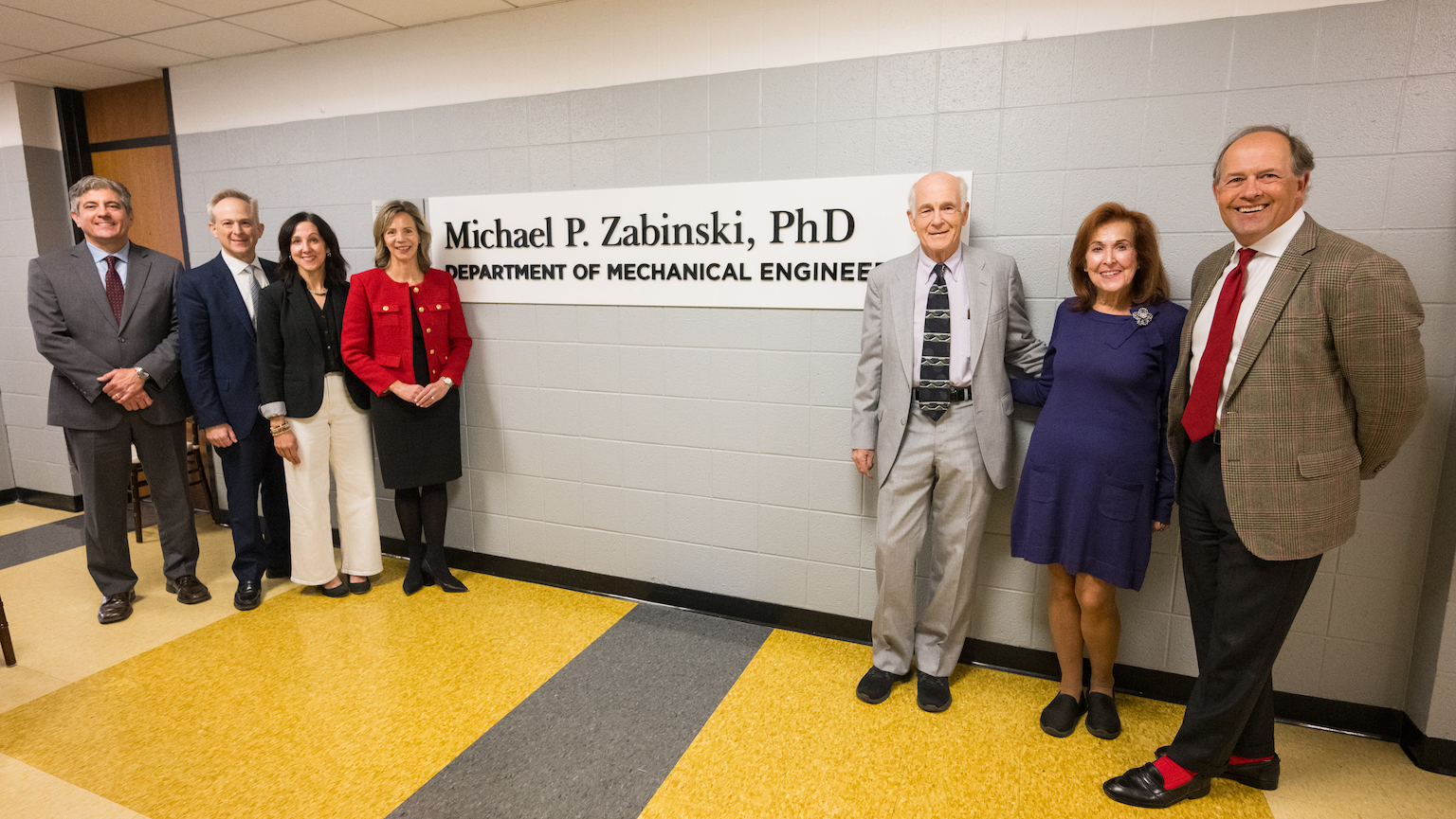 University's faculty and staff posing for pictures