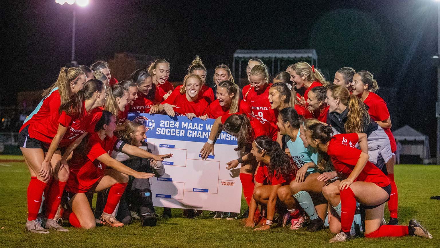 Image of women's soccer players celebrating