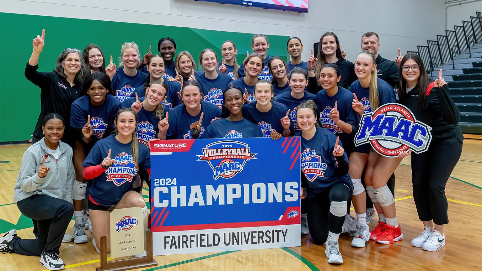 Image of women's volleyball players celebrating