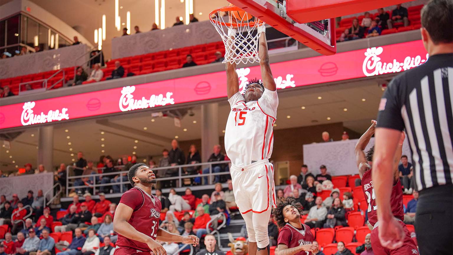 Image of an exciting basketball match taking place in the Leo D. Mahoney Arena