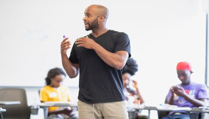 Image of William King in the classroom.