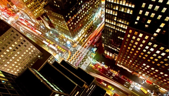 Aerial view of streets and buildings in New York City.