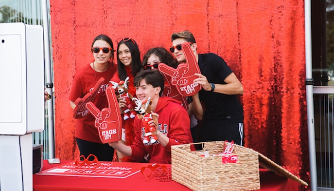 Fairfield University students taking a group photo at a Fairfield Friday event.