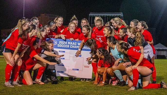 Image of women's soccer players celebrating