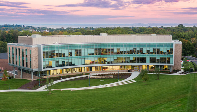 A striking image of the Dolan building, highlighting its unique design and integration into the campus.