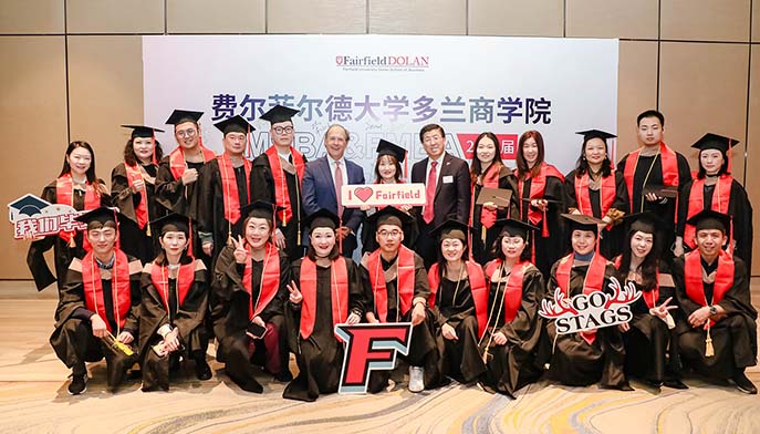 Image of President Mark R. Nemec, PhD, Dean Zhan Li, DBA, and Shanghai Fairfield students