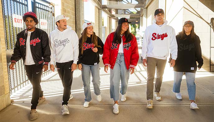 Image of student models wearing Fairfield University gear