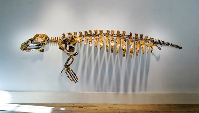 Christy Rupp, Remaining Balance Insufficient, life-size manatee skeleton, 2015, welded steel, gold credit cards, and plastic gift cards. Courtesy of the artist.