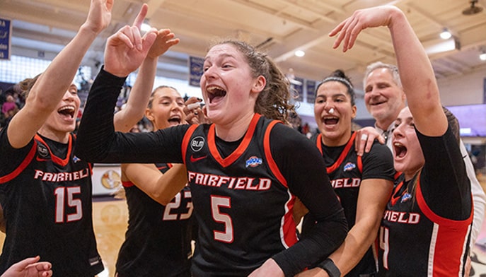 Meghan Andersen '27 and her teammates celebrate her 30-point performance in the Jan. 4 win at Niagara.