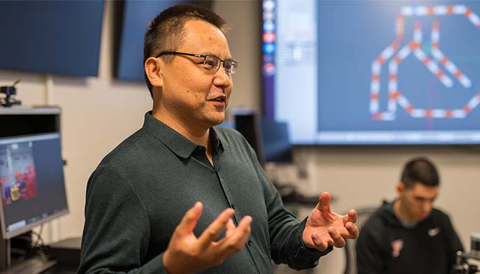 Image of engineering professor in classroom