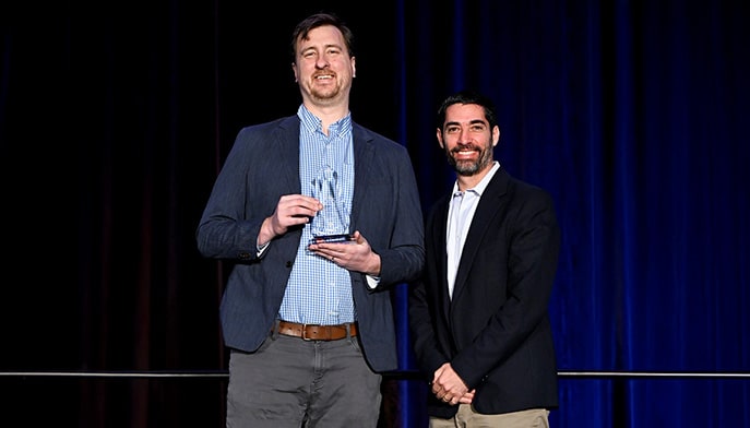 Dr. Drazan accepting his award.