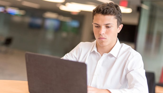 Student working on a laptop