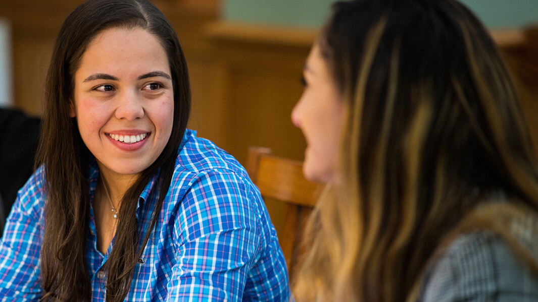 Two students talking together. 