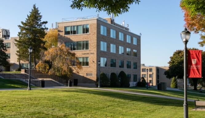 Canisius Hall on Fairfield’s campus with a blue sky behind.