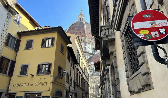 The top of the Duomo in Florence seen from the street. 