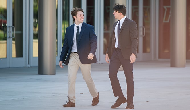 Students walking into the career fair in front of the rec plex. 