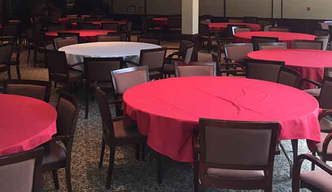 Photo of tables with tablecloths in the Conference Center Dining Room.