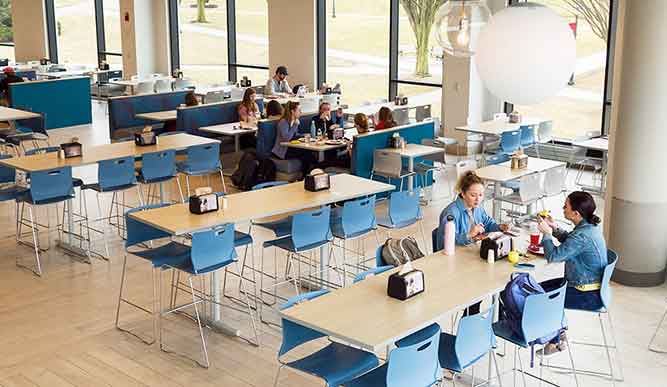 Interior of Tully dining hall with students eating.