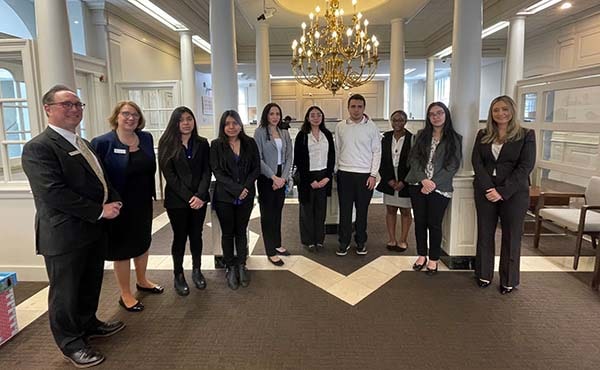 Bank of America awarded a $1 million grant to support the new Fairfield Bellarmine academic division - group standing posing for picture.